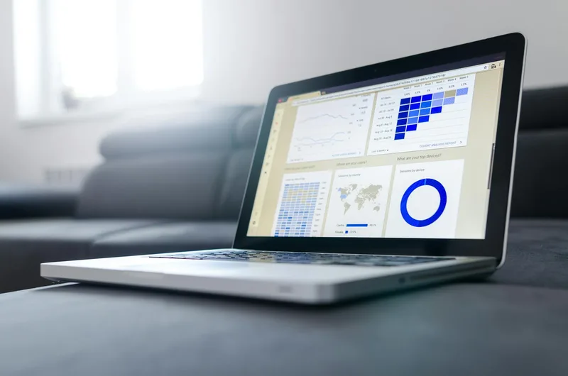 Laptop displaying analytics in a workspace — the TikTok Shop Data Dashboard provides traffic and conversion insights for US sellers